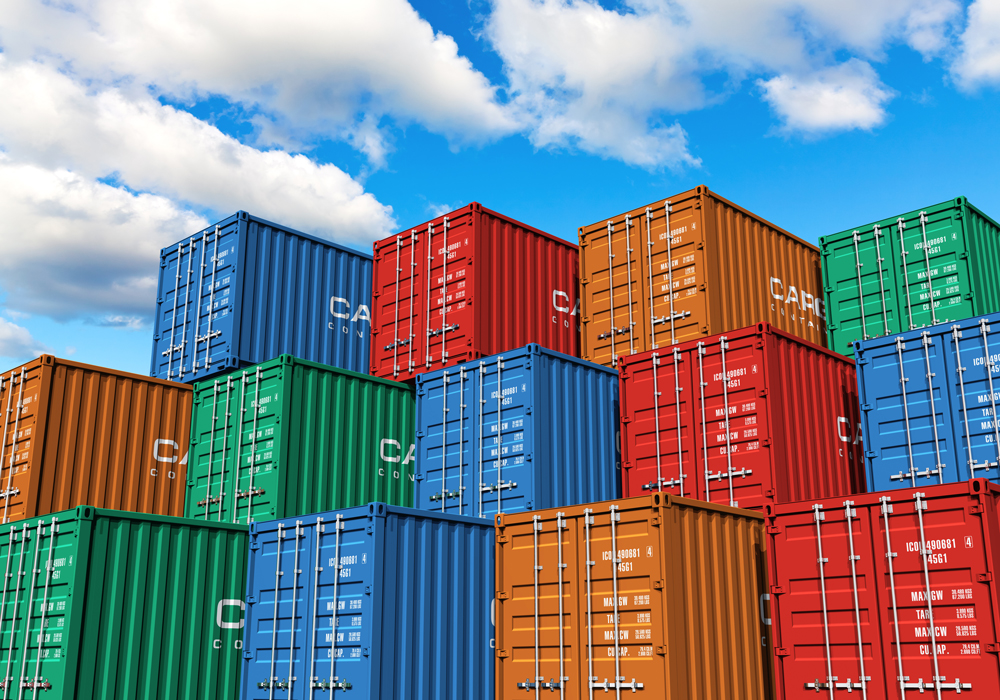 Blue skies with stacks and stacks of multi colored shipping containers