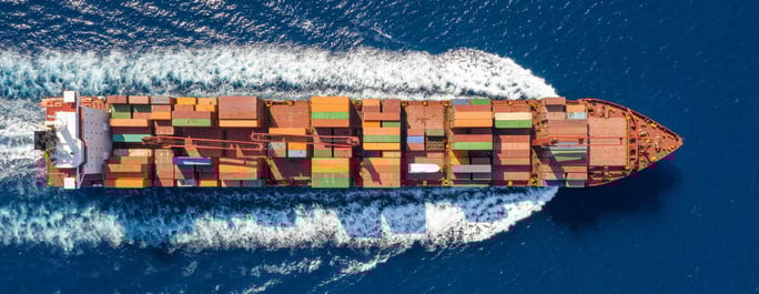 freight ship gliding through the ocean