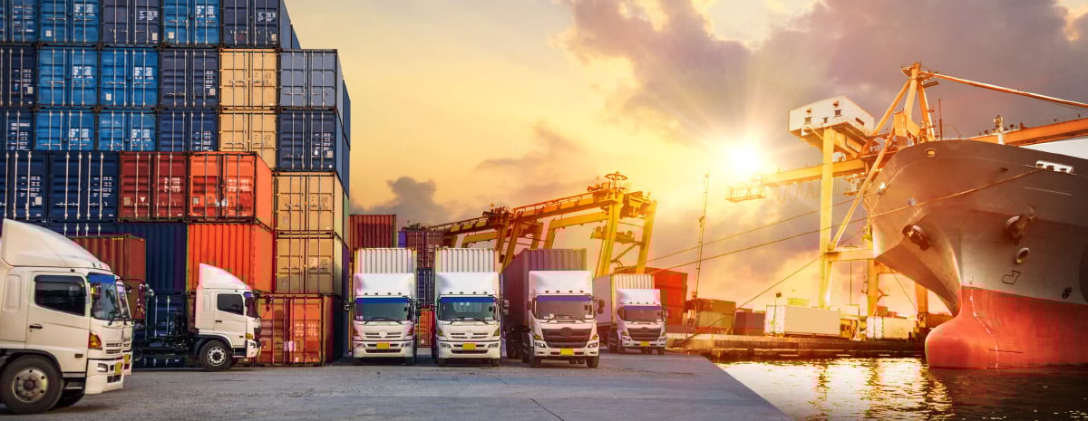 trucks and ships with freight containers