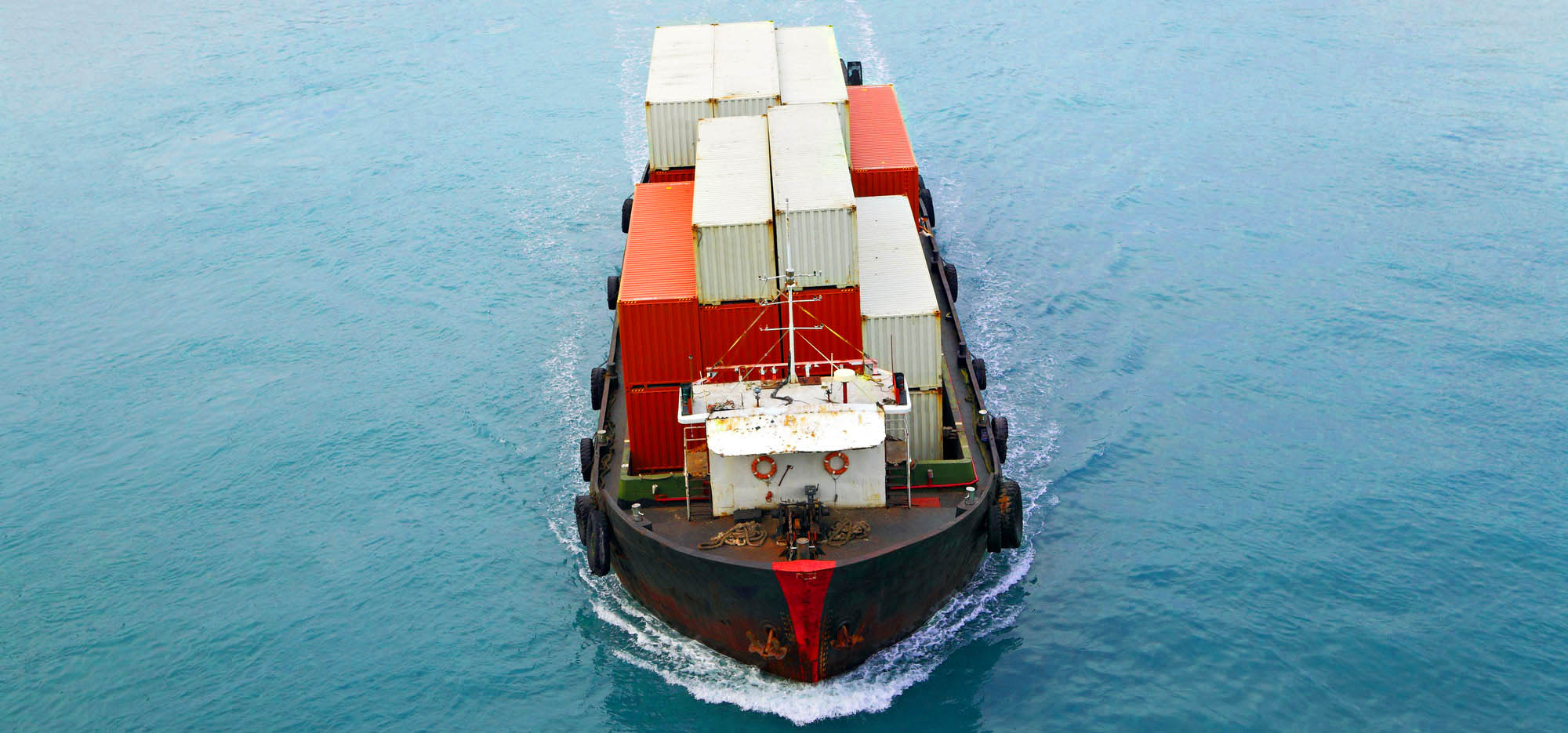 freight ship sailing on the water